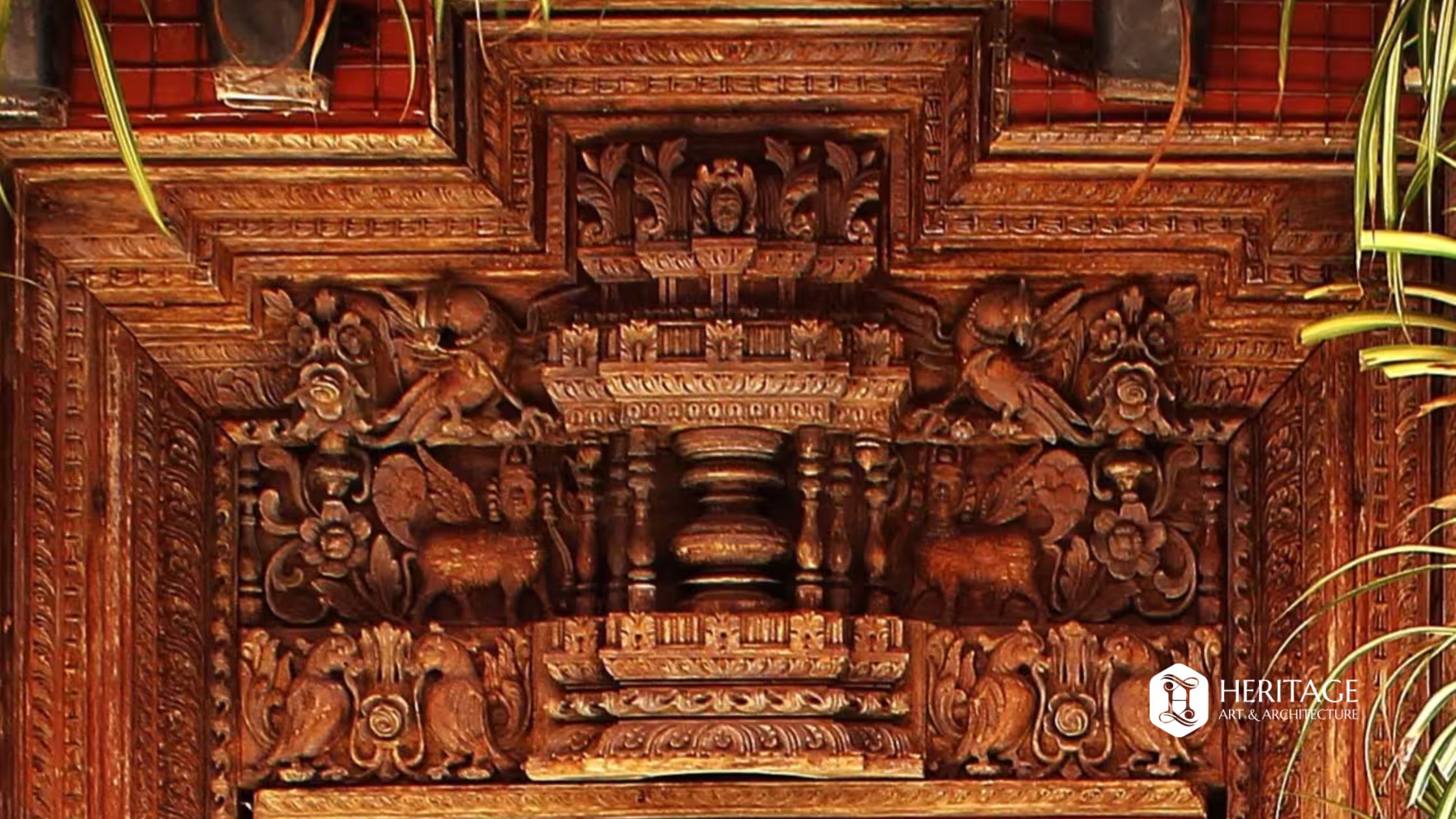Antique carved wooden door in a contemporary villa and resort interior